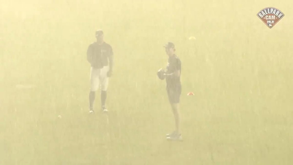 Cam Schlittler was getting his throwing in... and then it started POURING rain 😳😅 (via #BallparkCam)