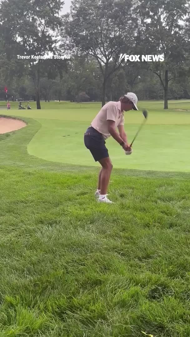 "Really dude?" Tiger Woods' son, Charlie, turns around in frustration after an iPhone camera shutter goes off in the middle of his swing during the U.S. Junior Amateur Championship playoff in Pennsylvania. The distraction comes at a critical moment as the 17-year-old competes in the championship on Wednesday, July 22. Charlie Woods was later eliminated after making a bogey on the opening playoff hole, ending his tournament run.