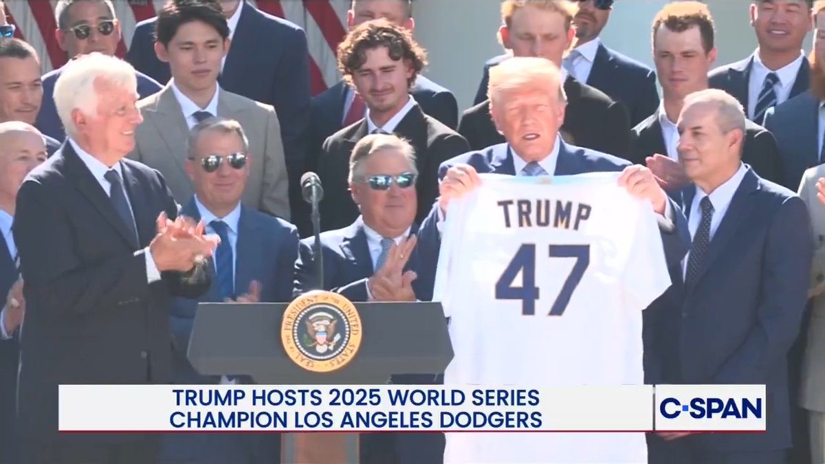 President Trump received a championship ring and a Los Angeles Dodgers jersey while hosting the 2025 World Series champions in the White House Rose Garden. The Dodgers defeated the Toronto Blue Jays in seven games to win their second consecutive World Series title.