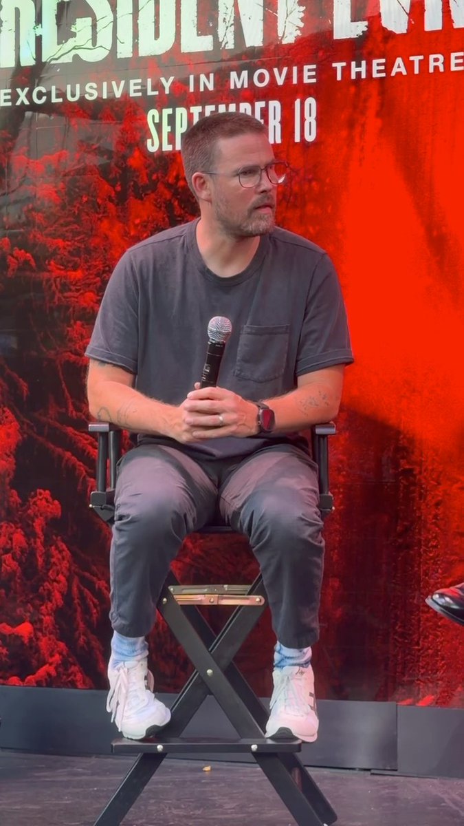 Director Zach Cregger shares how the #ResidentEvil movie will mirror the game's camera angles and first person perspective at a #SDCC panel.