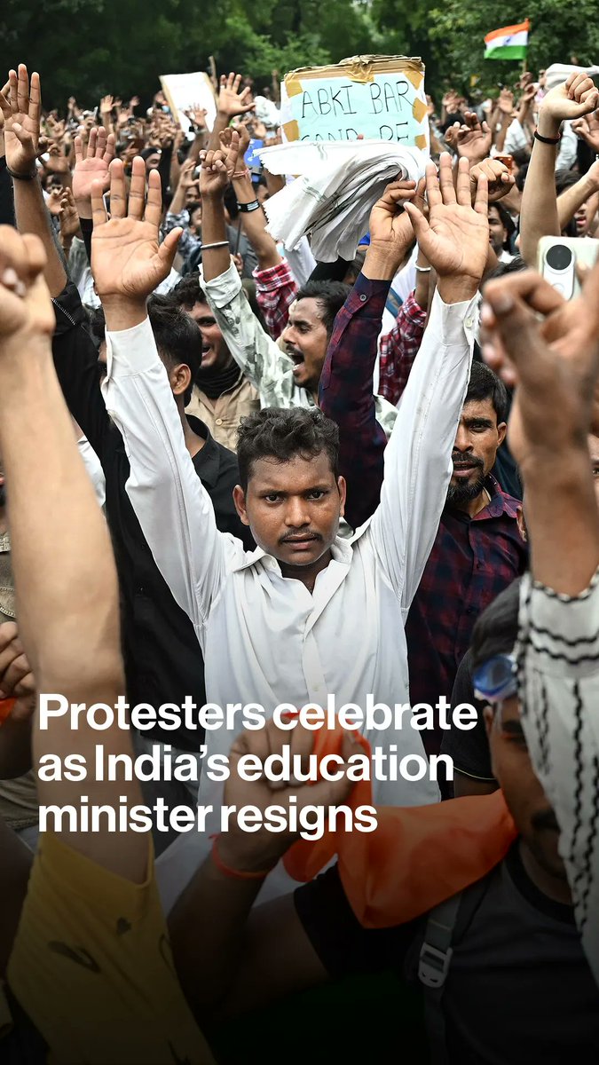 Cockroach Janta Party supporters celebrate the resignation of India's Education Minister Dharmendra Pradhan at Jantar Mantar in New Delhi, after protests over alleged exam irregularities.