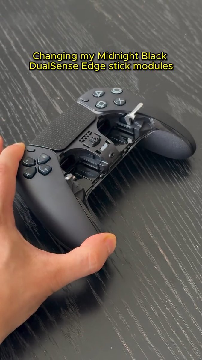 The Midnight Black DualSense Edge lets you change the analogue stick easily….