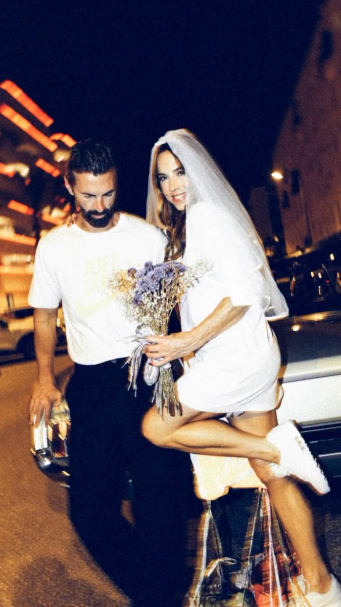 Mel C is one joyful newlywed! 💗 The Spice Girls star, 52, shared honeymoon snaps from her Ibiza celebration with husband Chris Dingwall, the couple sporting his and hers “Just Did It” T-shirts and Mel posing one question for fans: “Who caught the bouquet?” 💐 The photos come after the couple’s intimate Lake District wedding, where Melanie wore a custom gown by her former Spice Girls bandmate Victoria Beckham 👰🏻 📽️: melaniechisholm