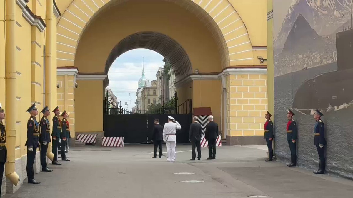 Putin arrived at the Admiralty to the soundtrack of the film "Officers." The presidential aura was greeted by Navy Commander-in-Chief Moiseyev, Chairman of the Russian Naval Board Patrushev, and Defense Minister Belousov.