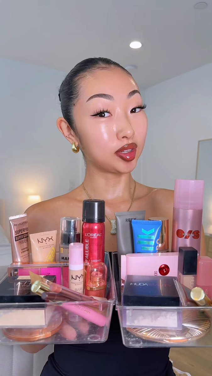 Full Face High End vs. Drugstore Dupes: Is the high price tag really worth it? She did a full face split comparison using high end luxury makeup on one side ($423 total) and affordable drugstore dupes on the other ($135 total)! Both sides blend seamlessly, but the affordable side definitely held its ground! Can you spot any differences? Which side would you pick? Let me know in the comments below!