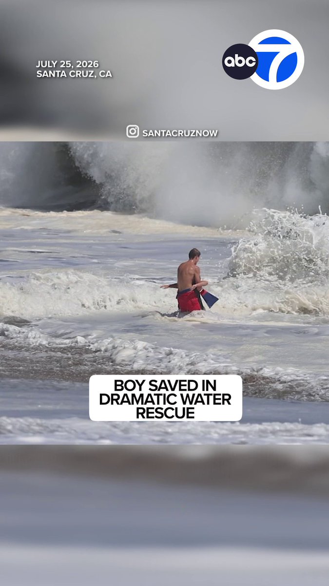 Intense video shows lifeguards battling powerful waves while working to bring a struggling swimmer to the shore in Santa Cruz.