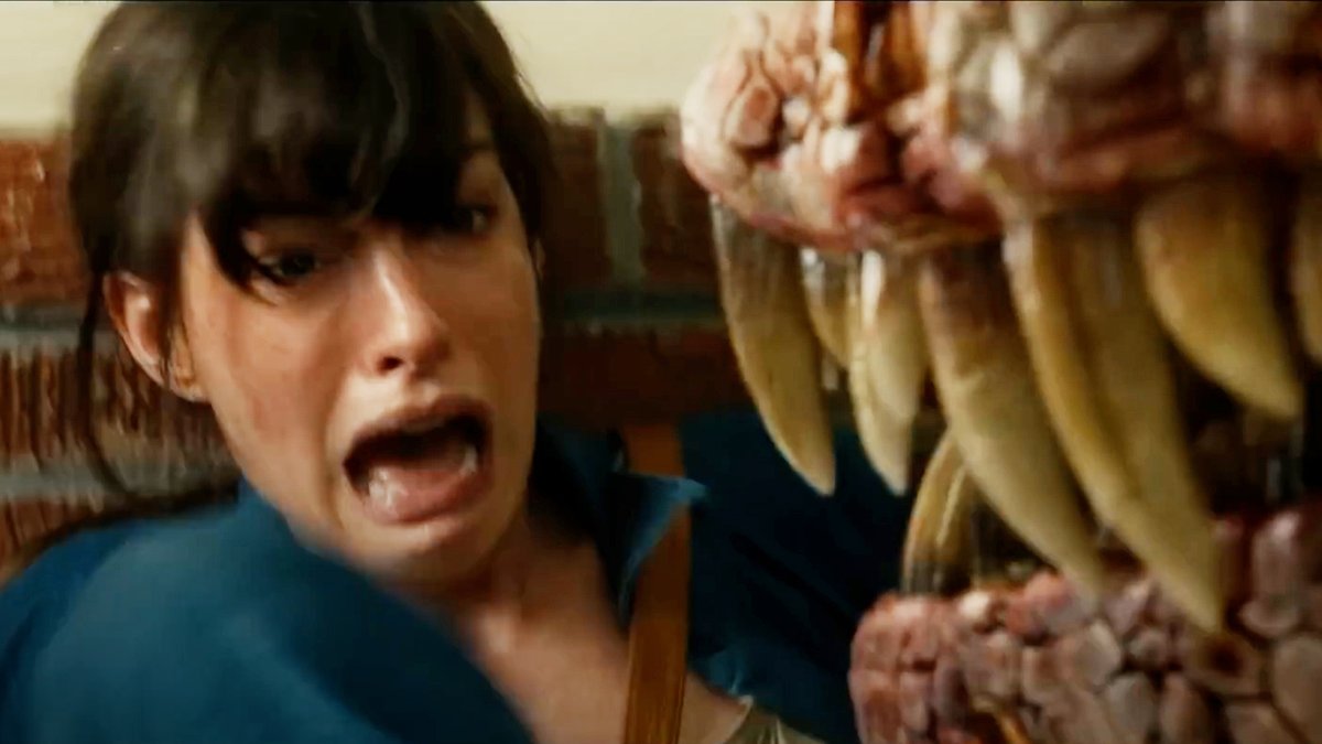 Anne Hathaway is chased by a dinosaur in this new clip from #TheEndOfOakStreet. In theaters on August 14.