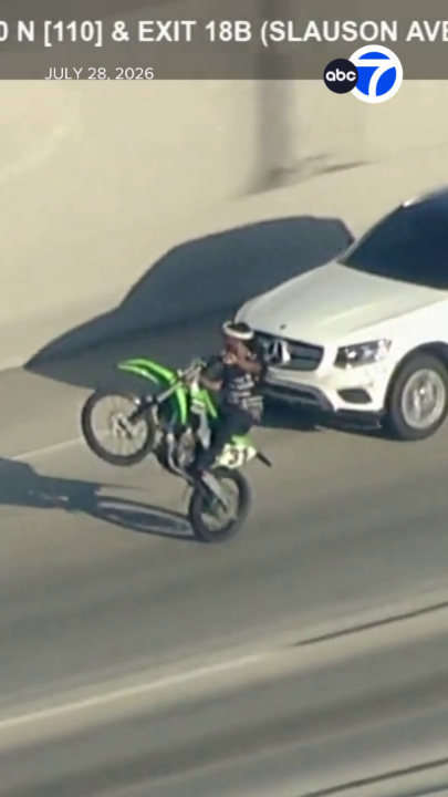 A driver in a reportedly stolen SUV led Los Angeles police on a high-speed chase that was marked by several dangerous encounters. In one of the chase's most harrowing moments, the suspect merged onto the freeway while being passed closely by motorcyclists, some of whom were popping wheelies with their front wheel in the air.