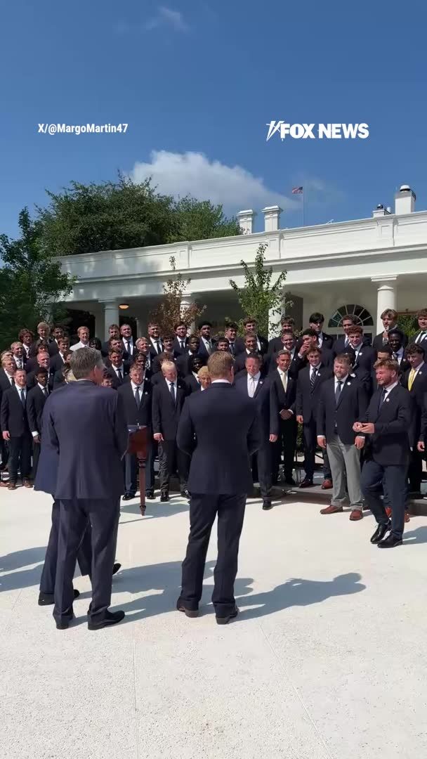 President Trump greets Montana State University's FCS National Championship team at the White House, then jokingly walks away wearing one of the team's championship rings. The Rose Garden erupts in laughter as Trump admires the ring before playfully pretending to keep it. | Margo Martin