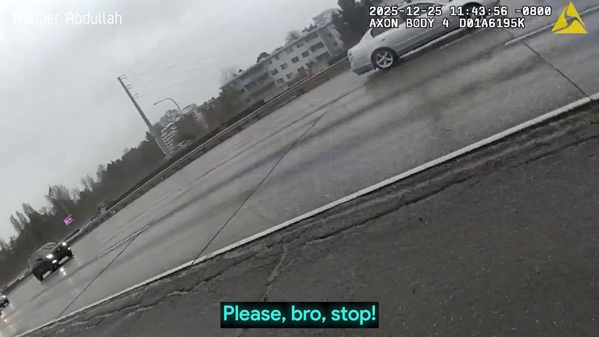State troopers were just trying to get a man safely off the interstate when everything suddenly went sideways. Seconds later, one trooper was left standing on the freeway watching her own patrol car disappear.