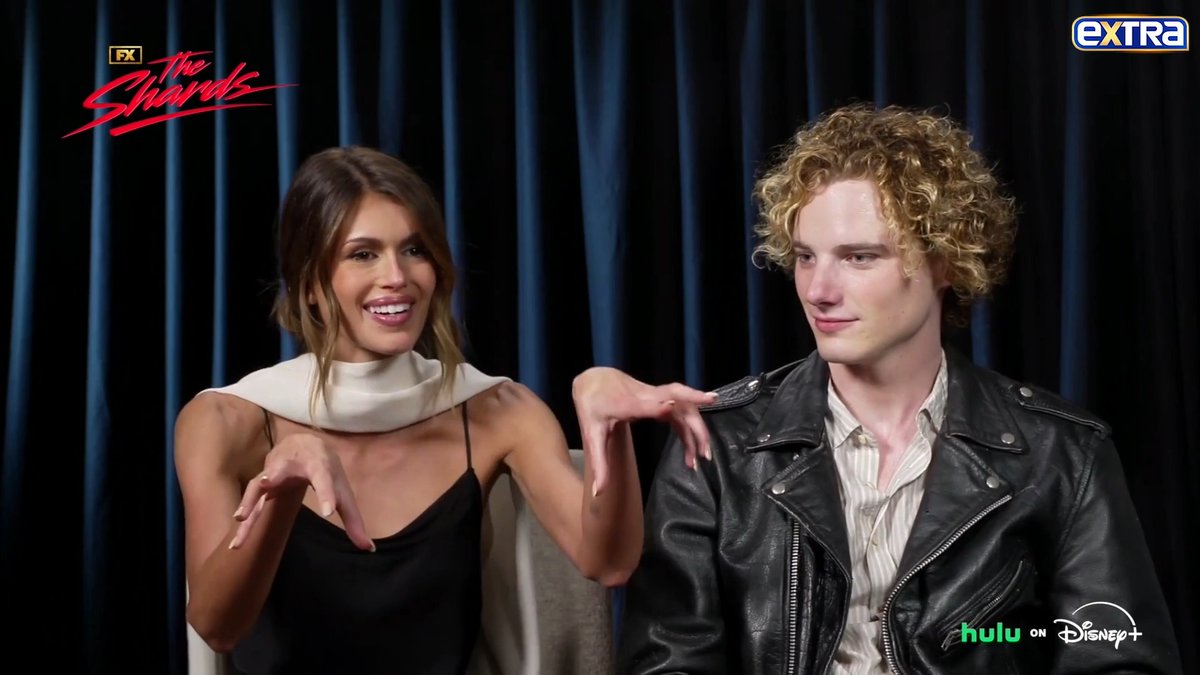 Kaia Gerber talks attending Taylor Swift and Travis Kelce's wedding with her parents! 🫶 Watch more 🔗: