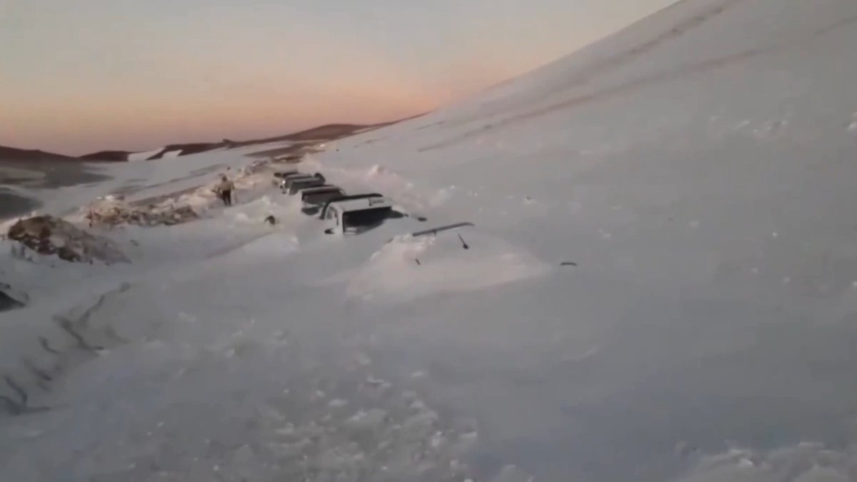 Argentina's National Gendarmerie released footage showing vehicles buried in snow near Fiambala, Catamarca, following a rescue operation to reach more than 100 tourists trapped by a snowstorm on the road to the Balcon del Pissis lookout