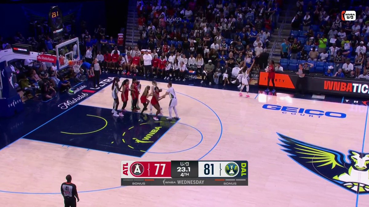 Allisha Gray shoots the three and Arike Ogunbowale gets called for the foul. The foul is upgraded to a flagrant 1 off the reckless closeout. Currently a 4 PT game with 18.8 left on the clock in the fourth quarter. #WNBAonUSA | Dream 💭 | Wings 🪽