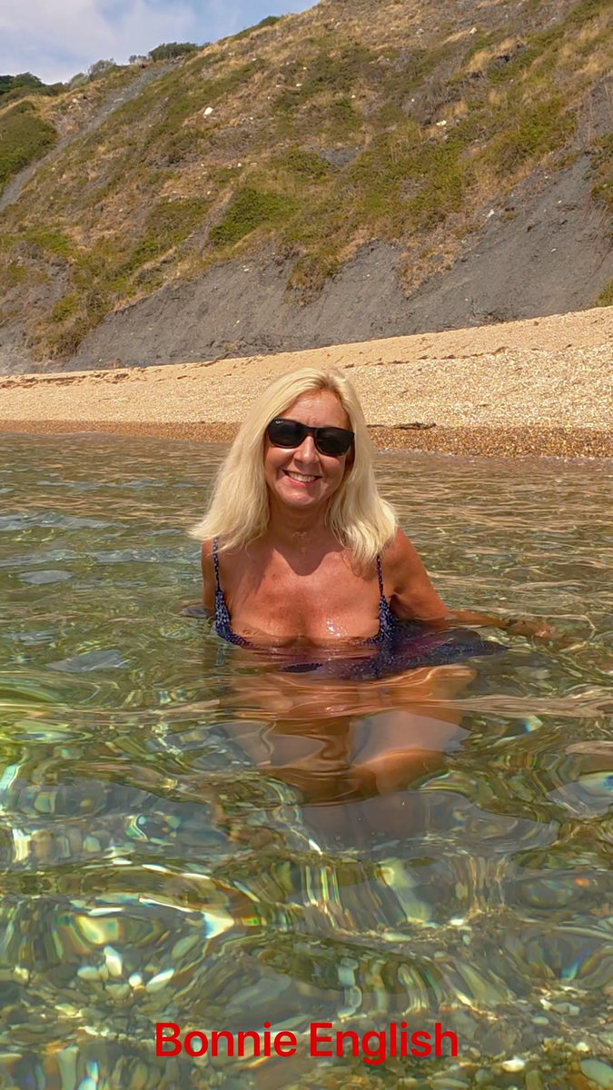 Slipping out of the ocean #summer #beach #blonde #mature #minidress