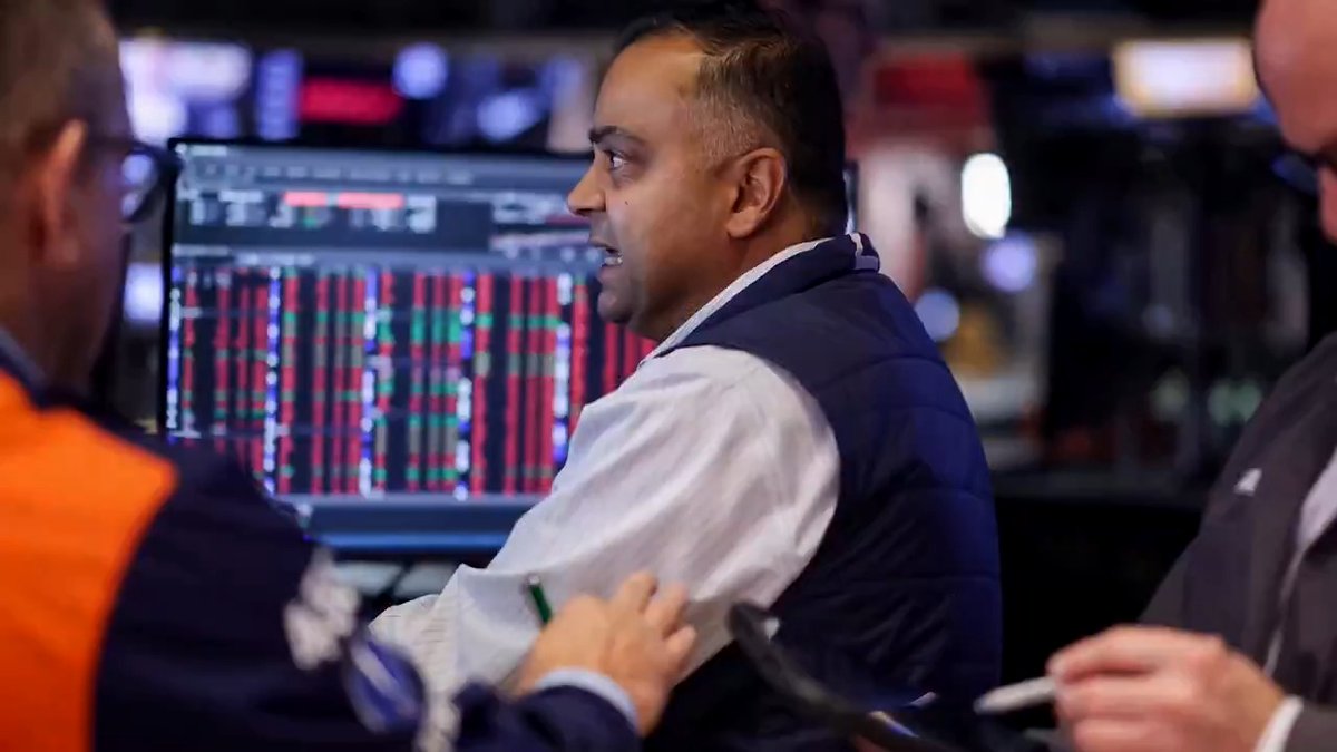 Wall Street ended higher, lifted by Amazon as the tech heavyweight's strong quarterly report bolstered investor confidence in AI-related stocks, while Apple dropped after its results disappointed investors