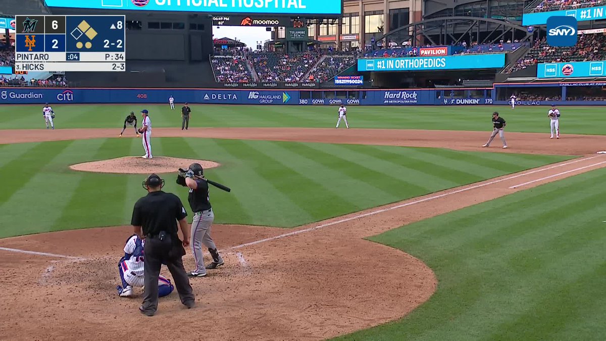 Esteury Ruiz takes his lead in front of second base as Jonathan Pintaro pitches
