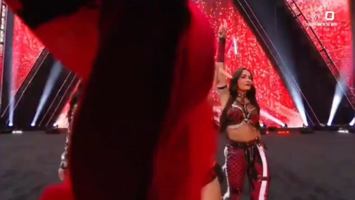 Ngl this was unintentionally funny. 😂 During her entrance, Nikki Bella tore &amp; threw her top towards the camera &amp; it accidentally got stuck on the lens. She had to remove it manually. You can see her smiling on this. 😆