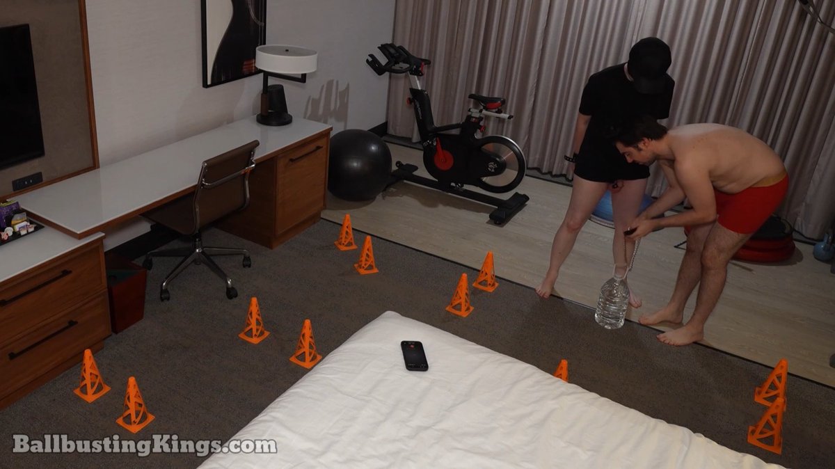 Ever chain a two gallon water jug and leash to your best friend’s bare ballsack then lead him through an obstacle course. That’s just a typical weekend for the Ballbusting Kings. Enjoy this extra long preview and subscribe to see the full video, which ends on one of the hardest kicks Mark’s nuts have ever received.