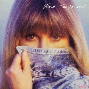 38 years ago today, Olivia Newton-John released The Rumour. The Rumour marked a new era for Olivia as her first studio album without longtime producer John Farrar. The title track was written by Elton John and Bernie Taupin, with Elton also producing the song and backing vocals.