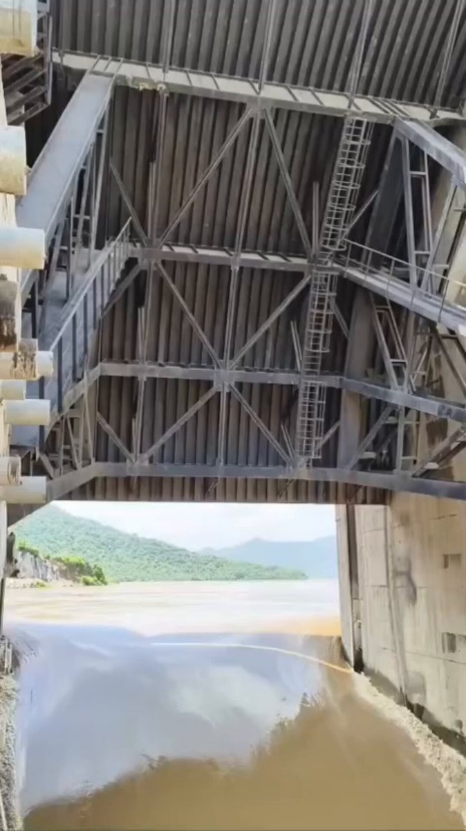 🚨 Just One Gate of Polavaram Can Theoretically Discharge a Massive 1,04,000 Cusecs! 📍Polavaram Project (Godavari) • 48 radial gates (16 m × 20 m each) • Design spillway capacity: 50,00,000 Cusecs. (≈141,435 cumecs) • Average theoretical discharge per gate at full design flow: ~1.04 lakh Cusecs (≈2,946 cumecs) Key point: A gate's actual discharge is not fixed. It varies with Reservoir water level (head), Gate opening, Tailwater level, Hydraulic conditions. So, dividing total spillway capacity by the number of gates gives only a theoretical average, not the real operating capacity of each gate. This is why engineers operate gates in different combinations during floods to safely pass inflows while protecting the dam and downstream areas. #Polavaram #Godavari #FloodManagement #DamEngineering #Hydrology