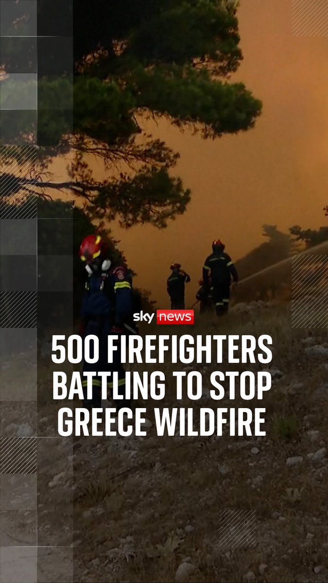 Nearly 500 firefighters battled a major wildfire in the west of Athens in the hope of halting its advance, as strong winds were dying down.