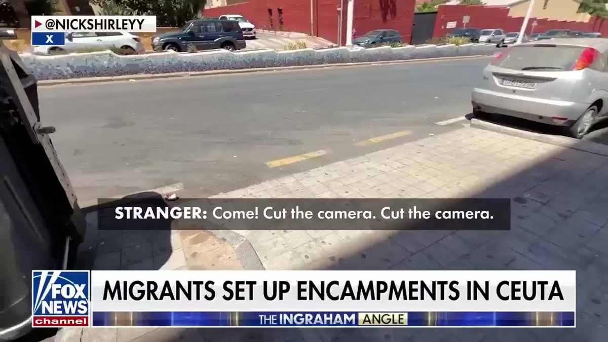 NEW: Nick shirley explains being chased and threatened with a knife through the streets of Ceuta, Spain allegedly by Moroccan migrants: "We saw a guy reach for his knife and he said he was going to stab both of us, so we obviously ran as far as we could." "Our car was parked like right next to where the guy was where he threatened to stab us so we had to get in a police car and then have them drop us off so we didn't get stabbed." Laura Ingraham