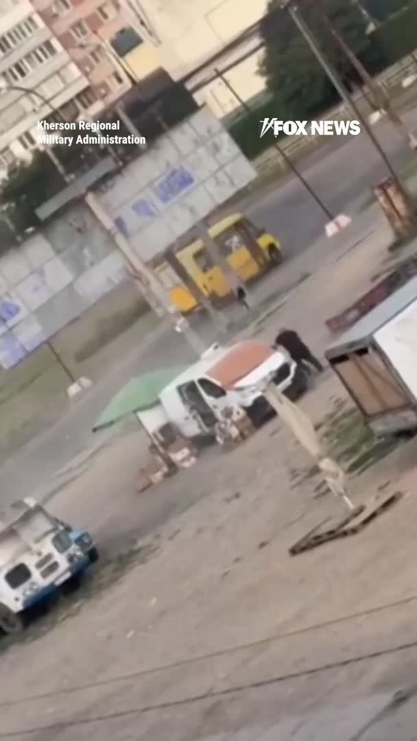 Dramatic new video shows a Ukrainian man running for safety as a drone chases after him in a market before the device detonates right next to him. Ukrainian police say the 52-year-old survived the August 4 attack with blast injuries, shrapnel wounds, and a concussion. Ukraine's Foreign Minister condemned the attack, describing it as a Russian war crime, claiming the drone operator was deliberately targeting a civilian.