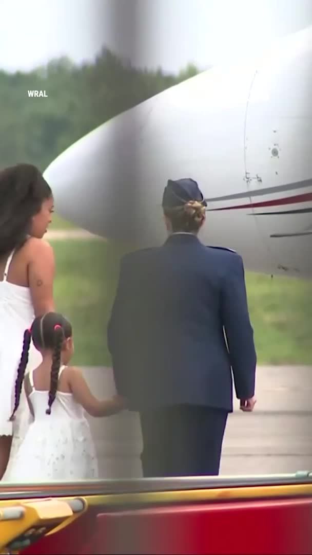 Staff Sgt. Michael Swinton's family, including his wife, gathered in grief Monday as they received his flag-draped casket at Fayetteville Regional Airport. The 30-year-old Fort Bragg soldier was killed on July 19 while disposing of a downed Iranian drone in Iraq, and was honored with a water cannon salute before a procession to Hope Mills. Swinton will be laid to rest following a funeral Saturday at Southview Baptist Church in North Carolina.