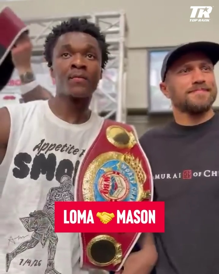Ring ambassador Abdullah Mason receives his official WBO lightweight title belt from former champ Vasiliy Lomachenko 👑