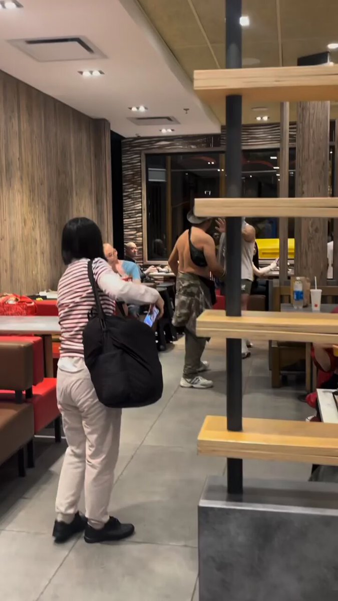Guy in boxing gloves gets pieced up in a fast food restaurant