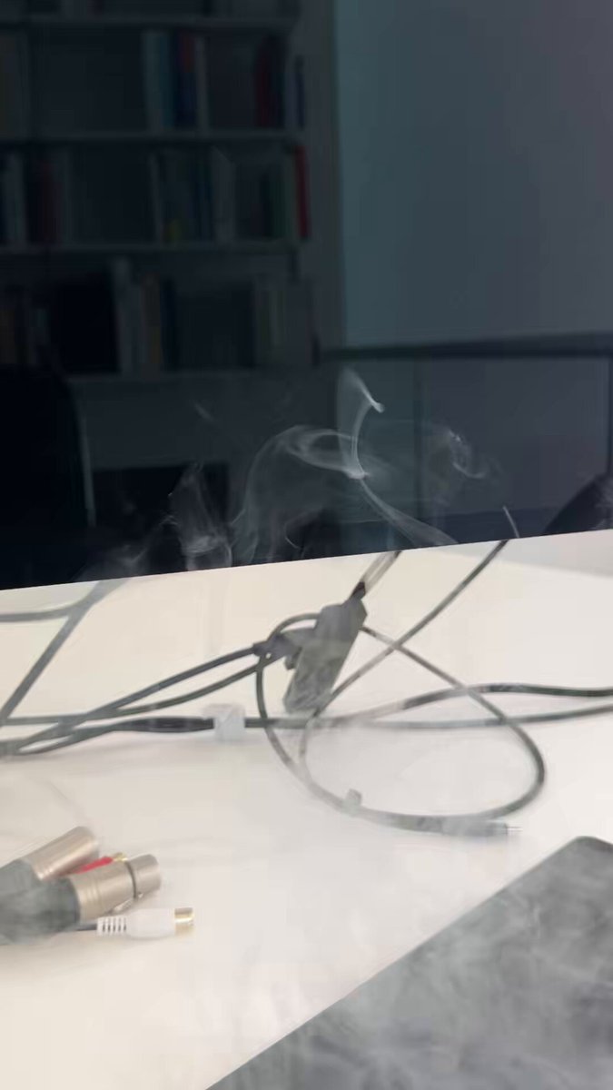 Holyshit Apple Studio Display XDR just exploded. Loud pop sound and then leaked capacitor smoke for good 30s. Sorry for the terrible video, caught the last few seconds because I wanted to unplug it first.