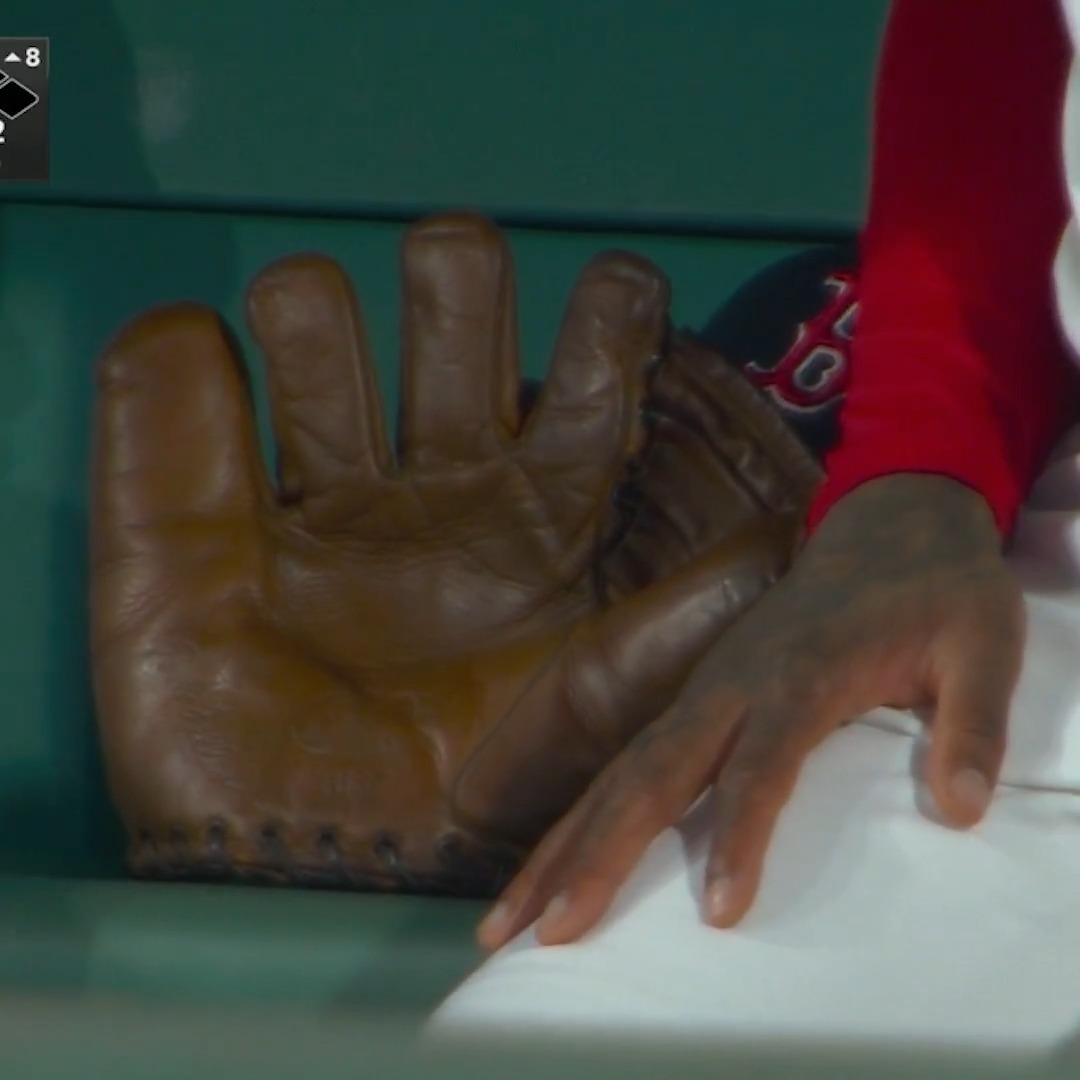 A fan gifted Aroldis Chapman a glove that looks as old as Fenway Park 😯