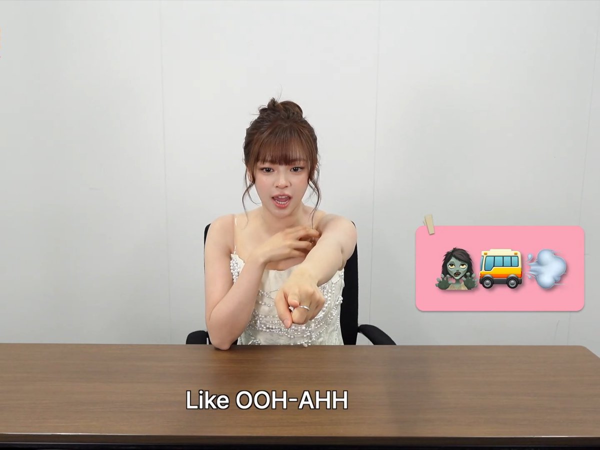 JEONGYEON playing "Guess the TWICE song by the Emoji"