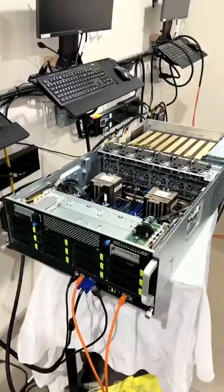 A dual-socket Xeon server with 512GB of ECC RAM sells for under $2,000 after AWS retires it. Two open chassis sit on a desk. Heatsinks the size of a fist. Every RAM slot filled. Fiber cables still warm. Network cards and PCIe risers that once pushed millions of requests a day. This is not a lab. It is someone’s workspace. Hardware built for five years of 24/7 load leaves the datacenter after three or four. A machine that cost $50,000 new appears on the used market for $500–2,000. The CPUs still work. The memory still works. Only the balance sheet changed. Dual-socket Xeons and hundreds of gigabytes of ECC RAM load models that choke consumer boards. Multiple VMs, databases, and inference jobs run at once without strain. That is the exact job these boards were designed for. The cost is power and noise. 500–1,000 watts under load. A jet-engine soundtrack. The electricity bill notices. Most people spend $2,000 on a mini PC with 128GB. This one cost less and delivers 512GB+ of server-grade memory plus dual enterprise CPUs that were processing production traffic six months earlier. A Mac Mini looks like a toy next to the heatsinks.