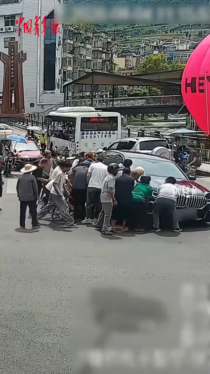 Kudos to all the kind-hearted people who stepped in!👍 In Bijie, southwest China's Guizhou Province, a distracted driver struck a man, trapping him under the car. Passersby immediately rushed over from all directions to help. In less than two minutes, they lifted the vehicle together and successfully pulled the injured man to safety. The man suffered abdominal and foot injuries, but thanks to the timely rescue and medical treatment, he is not in life-threatening danger. #URHero #ChinaStory