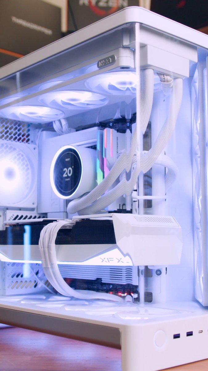 If you are looking for inspiration for a ultra clean aesthetic, this all white gaming PC build comes together in the absolute sleekest way possible. We built this rig around a full suite of NZXT components including the case, motherboard, power supply, fans, and liquid cooler, creating a unified and crisp foundation. Heart of the build features an Intel Core Ultra 7 270K Plus processor paired with high speed Acer Predator Gaming DDR5 memory and a Seagate Gaming FireCuda 540 NVMe SSD for rapid load times and the XFX Global Mercury RX 9070 XT White Magnetic Air graphics card for delivering heavy hitting frame rates while matching the white theme seamlessly. The finished system delivers top tier gaming performance with a clean presentation that looks stunning on any desk. Would you build an all white system like this for your own rig, or do you prefer traditional black components?