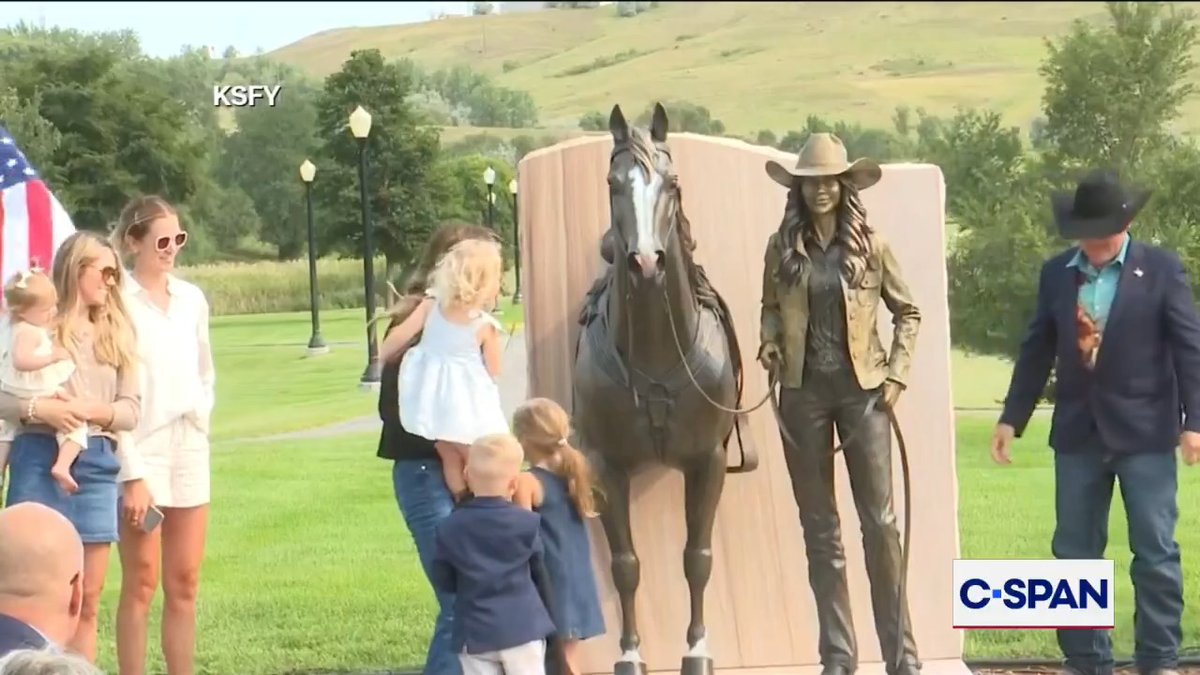 Kristi Noem unveils a bronze statue of her with a horse