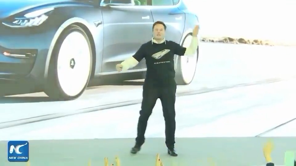 Elon Musk dances onstage at a Tesla event in China