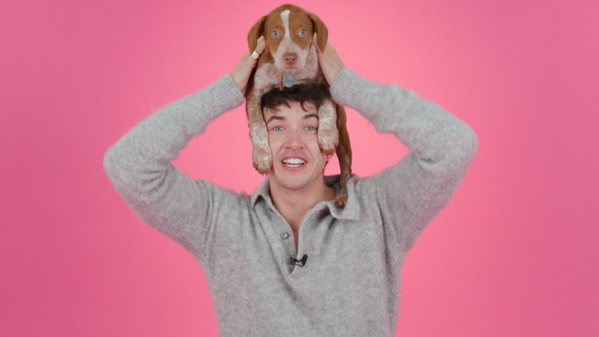 To celebrate "People We Meet On Vacation," we had Tom Blyth play with puppies while answering all of our questions.
