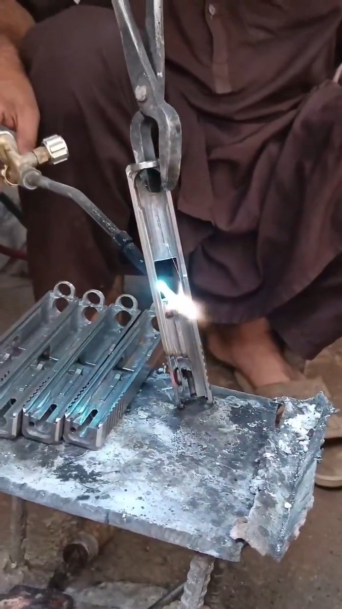 "Is the slide properly heat treated?" -Me "Inshallah" -Khyber Pass gunsmith "👀" -Me firing the first round with my non dominant hand just in case #craftsmanship #manufacturing #sandals #glock #gunsmith #inshallah #KhyberPass #pakistan