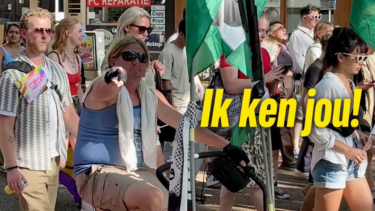 „Stand up, fight back!” Het Palestina-blok laat de bekende protestleuzen door de straten schallen. In de achterhoede duikt de man met de 🇵🇸-vlaggen-bakfiets opnieuw op, hij herkent de cameraman. 👋