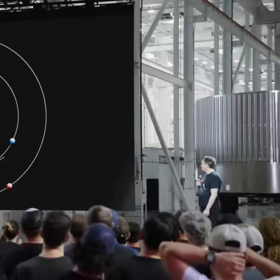 Elon Musk just told millions of Starlink customers that they have been quietly funding humanity’s road to Mars. Musk: “if you look on your Starlink Wi-Fi router, you will see this image.” The image is the transfer orbit to Mars. Earth on one side, Mars on the other, and the exact arc a ship has to fly between them. The map to another planet is printed on the router in your living room, because the two things are the same project. Musk: “you can’t just go straight to Mars, you have to create this elliptical orbit with Earth at one point and Mars at the other side at the far end of the ellipse and then time the where you are in that ellipse to intersect with Mars.” You cannot aim at where Mars is. You aim at where it will be, and you commit to that arc before you leave, because there is no correcting it once you are on it. The destination is not there when you depart. You are flying at a version of it that does not exist yet. Earth and Mars only line up for this roughly every twenty-six months. The universe hands out departure times and does not take requests. Musk: “the actual distance traveled on the arc is close to it like a thousand times further than the Moon.” A thousand times further than the farthest point any human being has ever traveled. The distance was never the hard part. Hohmann worked out this exact transfer in 1925. The math has been sitting finished for a century. What nobody could solve was money. Every previous attempt at deep space ran on government appropriations, which means it ran on election cycles. Programs that outlast a presidency are rare. Programs that outlast a generation barely exist. Musk: “Starlink internet is what’s being used to pay for humanity getting to Mars.” A rural household finally getting connected. A boat in the middle of the Pacific. A village nobody ever ran a line to. Every one of them is a payment toward a launch. Musk: “I’d just like to thank everyone out there who has bought Starlink because you are helping secure the future of civilization and helping make life multiplanetary.” That is not marketing language. That is accounting. The financing is the real breakthrough. Building something people want this month to pay for something that pays off after everyone alive is dead. Every monument in human history was built with money taken from people who were never asked. Tithes, taxes, tribute, conscription. The pyramids and the cathedrals and the moon landing were all funded by force. This is the first project at that scale that runs on people choosing it, which makes every dish on every roof a vote rather than a levy. Nobody had to be chosen for this. A working connection in a place the old providers gave up on puts you on the ledger. Every generation inherits one project large enough to be remembered by. Almost nobody alive for those ever got close enough to touch theirs. Civilizations do not get to choose whether they become permanent. They find out afterward. Every one before this looked up at the sky and wanted it. This is the first one writing the check.