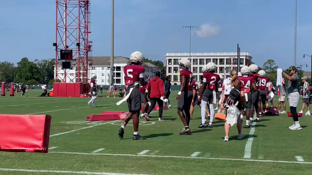 Alabama CB Dijon Lee (5) steps to the side to coach freshman Zyan Gibson (17) on Day 5 of fall camp.