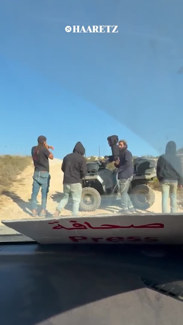 Settlers blocked two Haaretz journalists from reaching a home in the village and attacked them. Soldiers who arrived at the scene refused to assist the journalists. Earlier, soldiers were filmed praying with the settlers | Matan Golan and Itai Ron