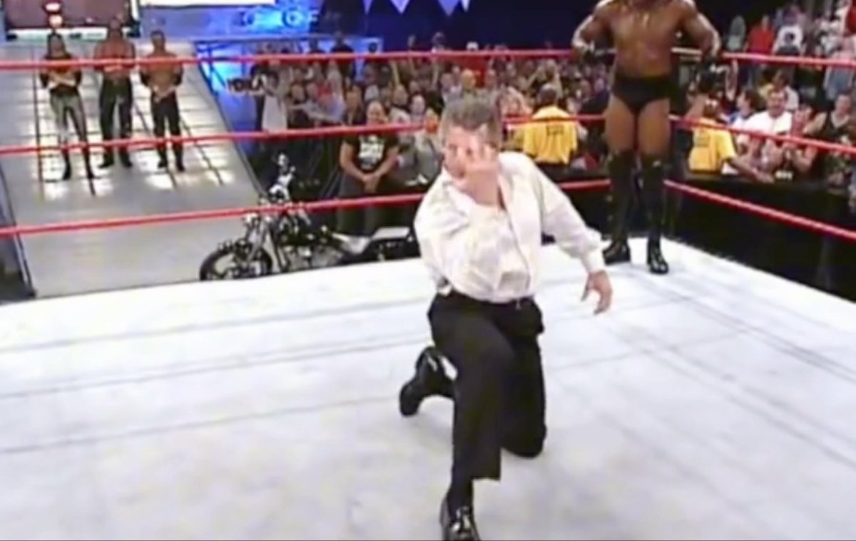24 years ago today Vince McMahon, The Rock, Booker T, Triple H, & Goldust all tried to get Undertaker to break character after the show ended and do the ‘Spinaroonie’ (2002)
