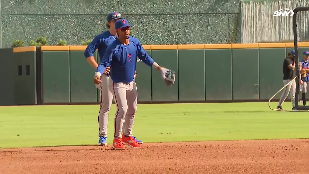 Nolan McLean takes grounder during BP behind Francisco Lindor Afterward, Lindor gave McLean some tips