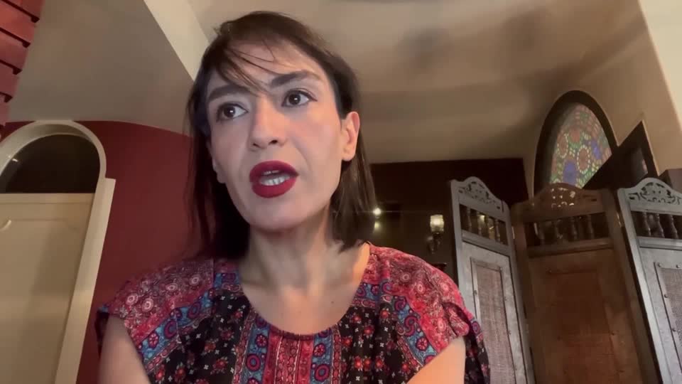 Iranian photojournalist Yalda Moaiery, known for documenting women's issues in Iran, vows to continue her work despite a 15-year prison sentence under espionage charges after sharing images and interviews with foreign media