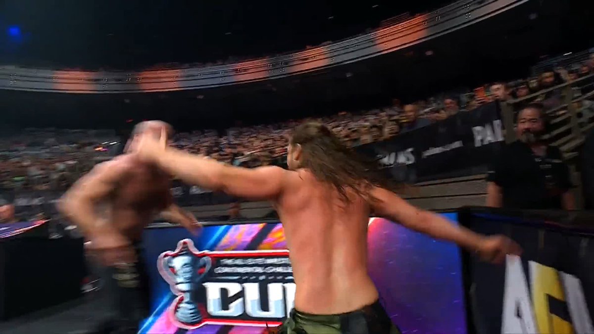 The strength of Jon Moxley is too much for @Boy_Myth_Legend to land the Sliced Bread as Moxley sends Perry crashing through a table at ringside! Watch #AEWDynamite LIVE on TBS & HBO Max