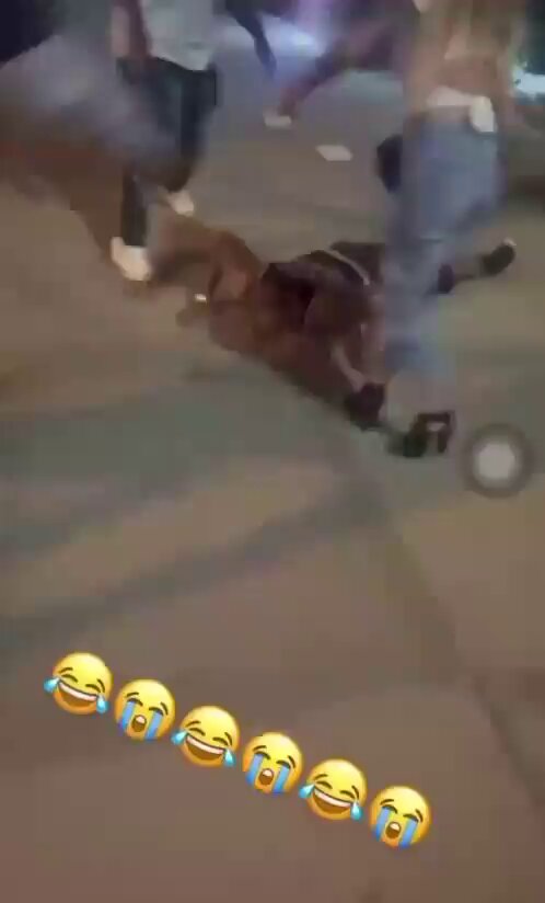 A white girl was slapped unconscious by her assailant while trying to protect her unconscious black boyfriend from being hit on the head