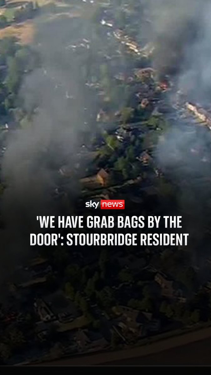 Multiple homes are on fire in Stourbridge in the West Midlands, as around 60 firefighters are tackling the grass fire near a golf course. Sky's Mark Austin speaks to Stourbridge resident Phillip Jones
